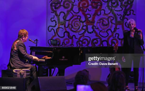 Sir Elton John and Joan Baez duet at the Woodside Gallery Dinner in benefit of Elton John AIDS Foundation in partnership with BVLGARI at Woodside on...