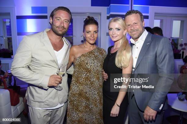 Sasha and his wife Julia Roentgen, Jenke von Wilmsdorff and his wife Mia Bergmann attend the Bertelsmann Summer Party on June 22, 2017 in Berlin,...