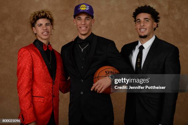 LaMelo Ball and LiAngelo Ball pose for a portrait with Lonzo Ball after being drafted number two overall to the Los Angeles Lakers during the 2017...