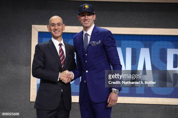 Leaf shakes hands with NBA Commissioner Adam Silver after being selected number eighteen overall by the Indiana Pacers during the 2017 NBA Draft on...