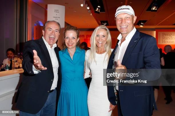 German presenter Wolfram Kons, Alexa Apermann, Patricia Schulz and Axel Schulz attend the 'Bertelsmann Summer Party' at Bertelsmann Repraesentanz on...