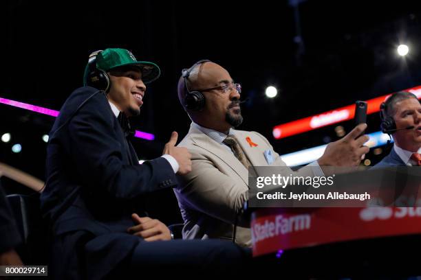 Jayson Tatum takes a selfie with Dennis Scott after being selected third overall by the Boston Celtics at the 2017 NBA Draft on June 22, 2017 at...