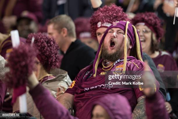 Queensland supporter in the crowd celebrates during game two of the State Of Origin series between the New South Wales Blues and the Queensland...