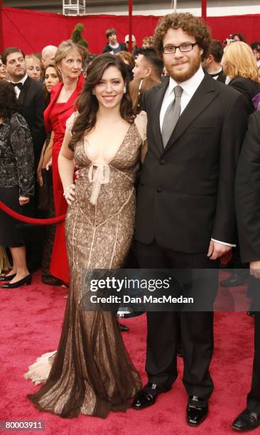 Lauren Miller and actor Seth Rogen arrive on the red carpet for The 80th Annual Academy Awards held at the Kodak Theater on February 24, 2008 in...