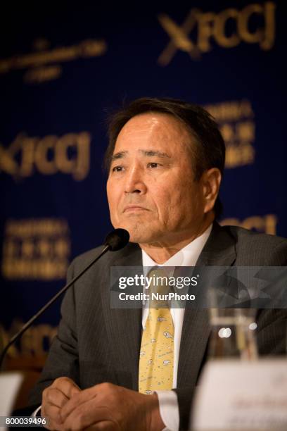 Prominent leader of the anti-base movement Hiroji Yamashiro speaks with reporters in Tokyo, Japan on June 23, 2017. Mr. Yamashiro was arrested and...