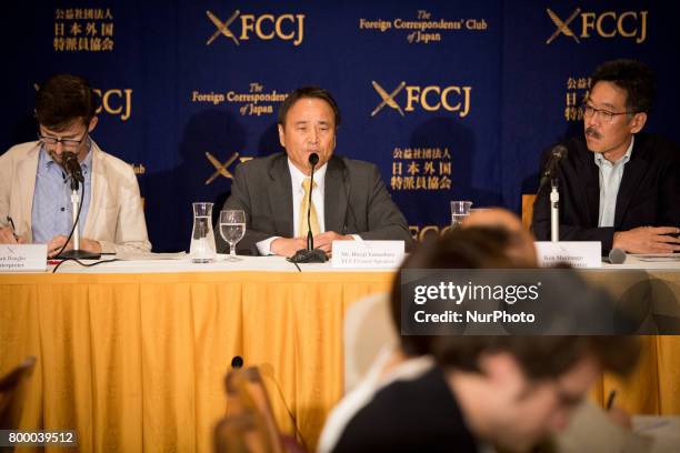 Prominent leader of the anti-base movement Hiroji Yamashiro speaks with reporters in Tokyo, Japan on June 23, 2017. Mr. Yamashiro was arrested and...