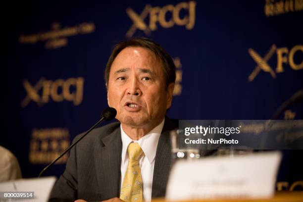 Prominent leader of the anti-base movement Hiroji Yamashiro speaks with reporters in Tokyo, Japan on June 23, 2017. Mr. Yamashiro was arrested and...