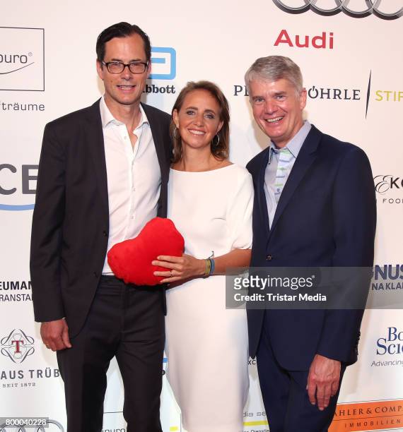 Thomas Wuelfing, Jonica Jahr and heard surgeon Hermann Reichenspurner attend the Charity Evening 'Das kleine Herz im Zentrum' at Curio Haus on June...