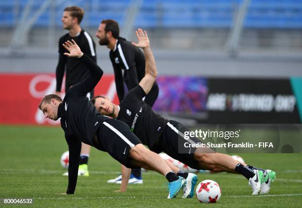 Chris Wood stretches during a training session of the New Zealand national football team on June 23, 2017 in Saint Petersburg, Russia.