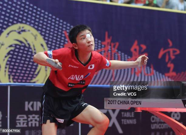 Tomokazu Harimoto of Japan competes during the men's singles first round match against Vladimir Samsonov of Belarus on the day one of the 2017 ITTF...