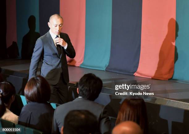 Japanese kabuki star Ichikawa Ebizo attends a press conference in Tokyo on June 23 after his wife Mao Kobayashi, a 34-year-old Japanese TV...