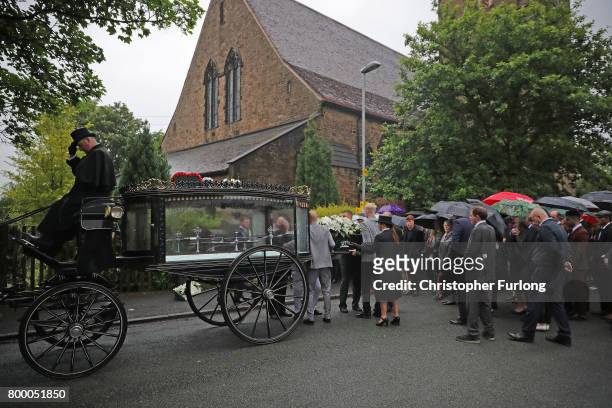 The funeral cortege of Manchester attack victim Alison Howe arrives at St Anne's Church on June 23, 2017 in Oldham, England. Alison Howe, from...