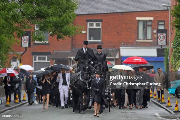 The funeral cortege of Manchester attack victim Alison Howe arrives at St Anne's Church on June 23, 2017 in Oldham, England. Alison Howe, from...