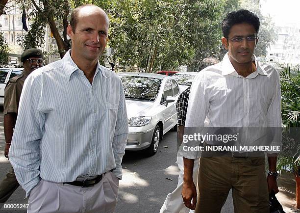 Former South African cricketer and new Indian cricket coach Gary Kirsten arrives along with test team captain Anil Kumble at the Cricket Club of...