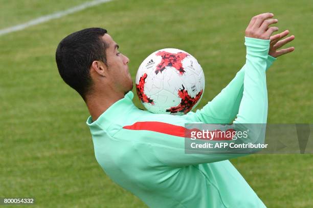 Portugal's forward Cristiano Ronaldo takes part in a training session in Saint Petersburg on June 23, 2017 on the eve of the 2017 FIFA Confederations...