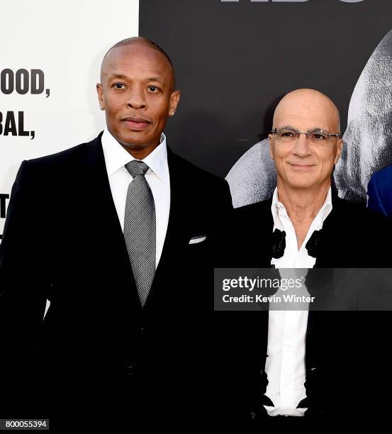 Producers Dr. Dre and Jimmy Iovine arrive at the premiere screening of HBO's "The Defiant Ones" at Paramount Studios on June 22, 2017 in Los Angeles,...