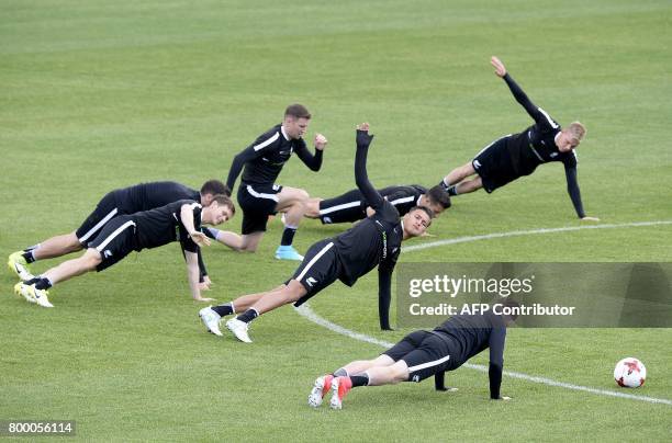 New Zealand's players take part in a training session at the Petrovsky Stadium in Saint Petersburg on June 23, 2017 on the eve of the 2017 FIFA...