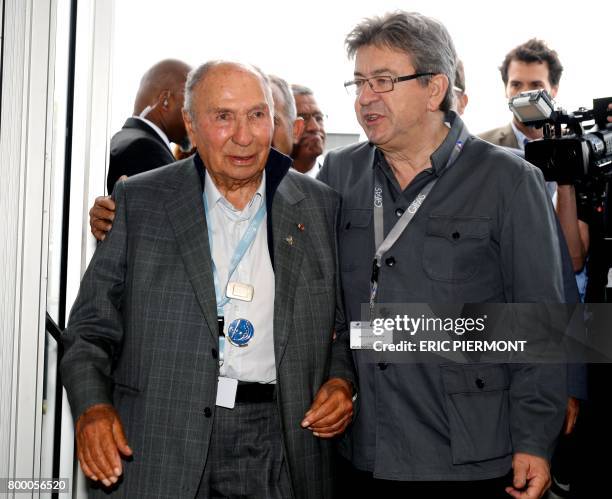 La France Insoumise leftist party's members of parliament, party leader Jean-Luc Melenchon talks with Chairman of Dassault Group Serge Dassault at Le...