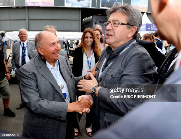 La France Insoumise leftist party's members of parliament, party leader Jean-Luc Melenchon shakes hands with Chairman of Dassault Group Serge...