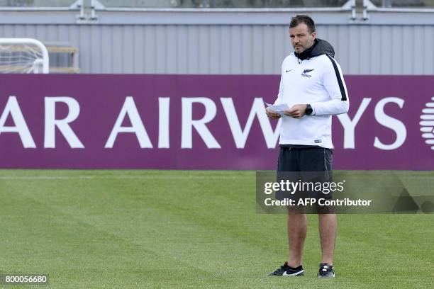 New Zealand's English coach Anthony Hudson attends a training session at the Petrovsky Stadium in Saint Petersburg on June 23, 2017 on the eve of the...