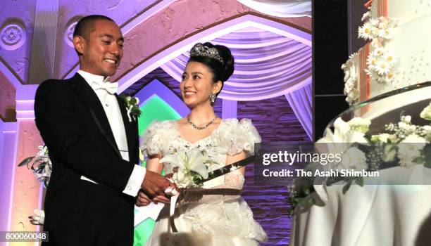 Kabuki actor Ebizo Ichikawa and former TV anchor Mao Kobayashi during their wedding on July 29, 2010 in Tokyo, Japan.