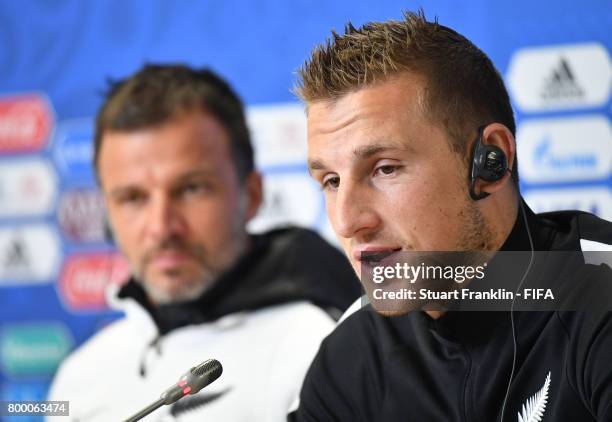 Anthony Hudson, head coach looks on as Captain Chris Wood talks to the media during a press conference after a training session of the New Zealand...