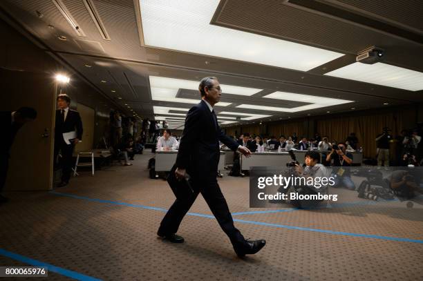 Satoshi Tsunakawa, president and chief executive officer of Toshiba Corp., arrives for a news conference in Tokyo, Japan, on Friday, June 23, 2017....