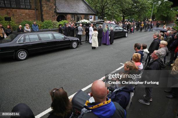 The funeral cortege of Manchester attack victim Alison Howe leaves St Anne's Church on June 23, 2017 in Oldham, England. Alison Howe, from Royton,...