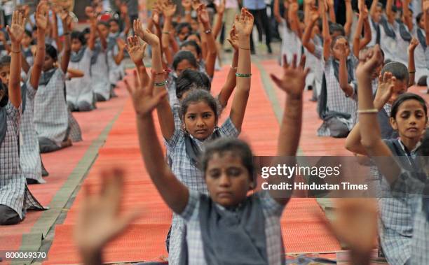 Children perform Yoga on the International Yoga Day at The National Sports Club of India , Worli, on June 21, 2017 in Mumbai, India. International...