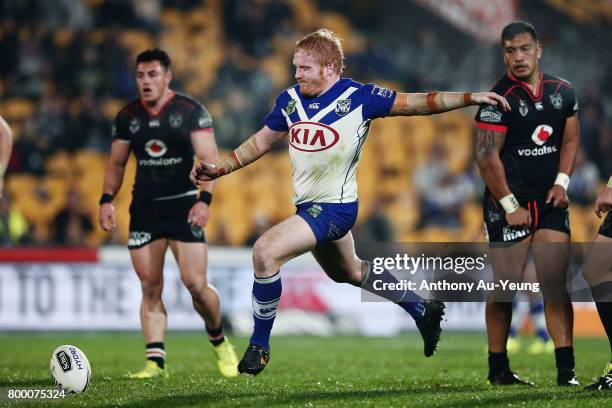 James Graham of the Bulldogs kicks the ball out of frustrations after dropping the ball during the round 16 NRL match between the New Zealand...