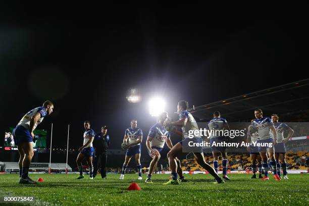 Players of the Bulldogs warmup prior to the round 16 NRL match between the New Zealand Warriors and the Canterbury Bulldogs at Mt Smart Stadium on...