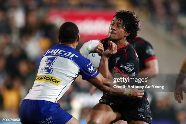 James Gavet of the Warriors clashes with Aiden Tolman of the Bulldogs during the round 16 NRL match between the New Zealand Warriors and the...