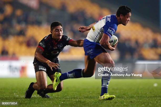 Chase Stanley of the Bulldogs makes a run against Ata Hingano of the Warriors during the round 16 NRL match between the New Zealand Warriors and the...