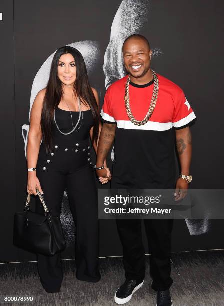Rapper Xzibit and wife Krista Joiner attend the premiere of HBO's 'The Defiant Ones' at Paramount Theatre on June 22, 2017 in Hollywood, California.