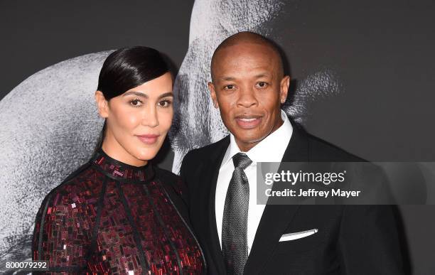 Music producer Dr. Dre and wife Nicole Young attend the premiere of HBO's 'The Defiant Ones' at Paramount Theatre on June 22, 2017 in Hollywood,...