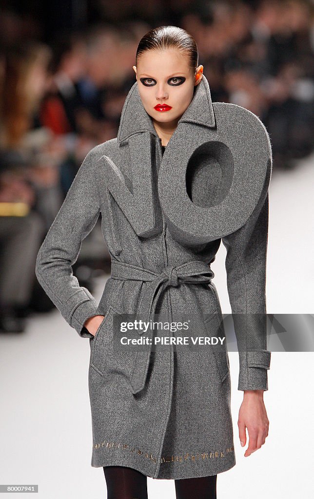 A model presents a creation by Dutch des