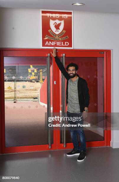 Mohamed Salah poses after new signing for Liverpool at Anfield on June 23, 2017 in Liverpool, England.