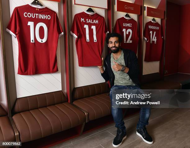 Mohamed Salah poses after new signing for Liverpool at Anfield on June 23, 2017 in Liverpool, England.