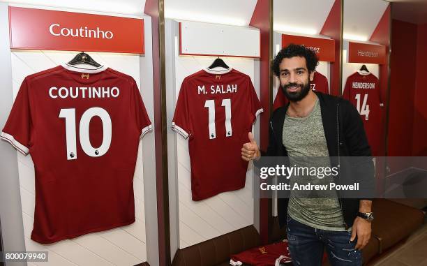 Mohamed Salah poses after new signing for Liverpool at Anfield on June 23, 2017 in Liverpool, England.