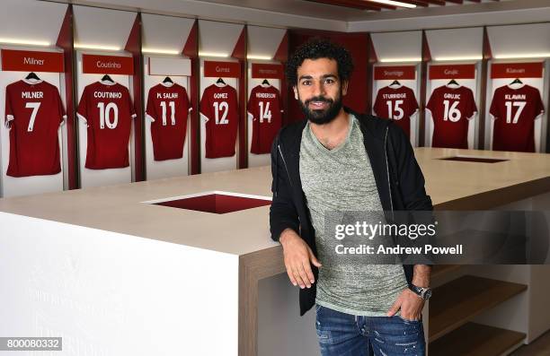 Mohamed Salah poses after new signing for Liverpool at Anfield on June 23, 2017 in Liverpool, England.