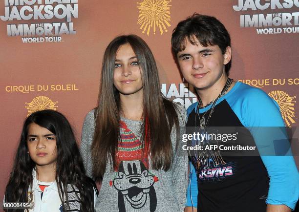 Prince Michael "Blanket" Jackson, Paris Jackson and Prince Jackson arrive at the Michael Jackson The Immortal World Tour in Los Angeles, California,...