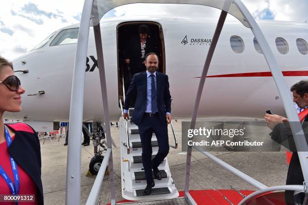 French Prime Minister Edouard Philippe disembarks from a Dassault Aviation Falcon 8X jet during a visit to the International Paris Air Show in Le...
