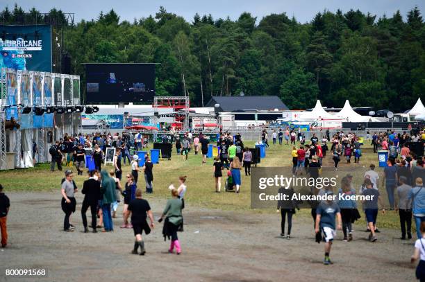 Festival goers stroll along the Hurricane Festival 2017 on June 23, 2017 in Scheessel, Germany. The gates of the festival have officially opened,...