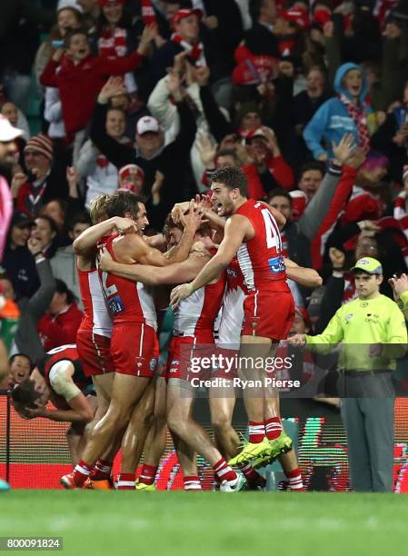 Gary Rohan of the Swans celebrates after kicking the winning goal after the siren during the round 14 AFL match between the Sydney Swans and the...