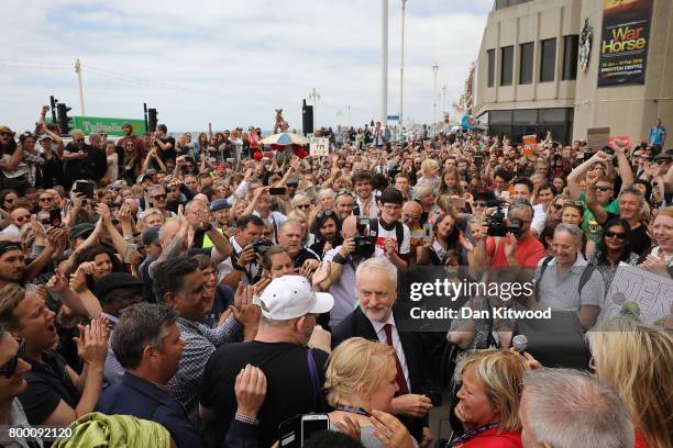 Labour Leader Jeremy Corbyn speaks to activists outside the conference centre after addressing delegates at the Unison Conference on June 23, 2017 in...