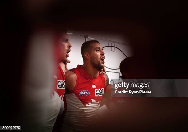 Lance Franklin of the Swans sings the club song after the round 14 AFL match between the Sydney Swans and the Essendon Bombers at Sydney Cricket...