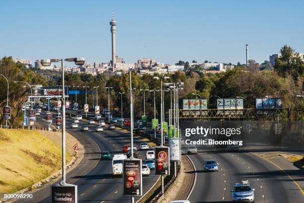 Buildings stand on the city skyline in the Central Business District beyond the M1 freeway in Johannesburg, South Africa, on Thursday, June 22, 2017....