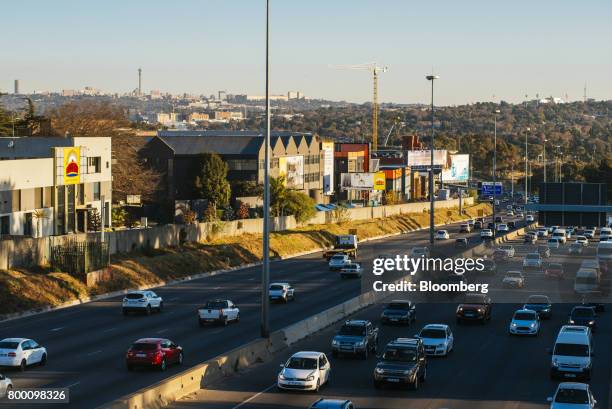 Buildings stand on the city skyline in the Central Business District beyond the M1 freeway in Johannesburg, South Africa, on Thursday, June 22, 2017....