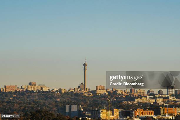 Buildings stand in the Central Business District on the city skyline seen from the Sandton district of Johannesburg, South Africa, on Thursday, June...