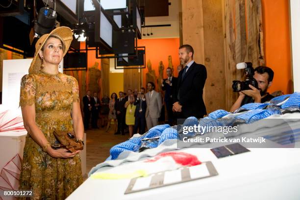 King Willem-Alexander of The Netherlands and Queen Maxima of The Netherlands visit the Design Museum Triennale where the King and the Queen get...